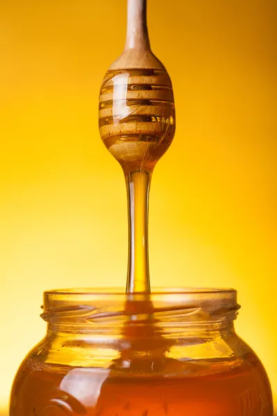 depositphotos_21341495-stock-photo-flowing-golden-honey